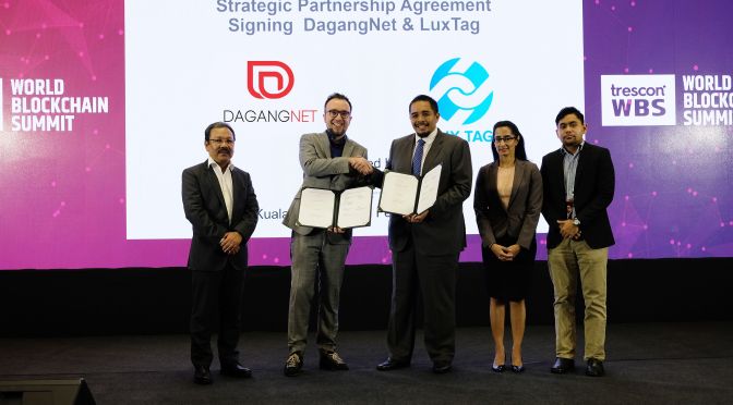 Strategic Partnership Agreement signing between Luxtag and DagangNet at World Blockchain Summit 2019