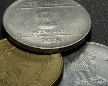 Three Indian coins of different values dated 2009